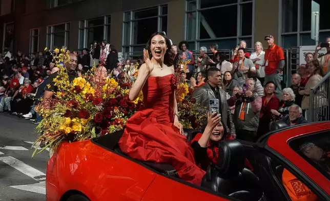 Olympic gold medalist and Grand Marhsal Eileen Gu waves during the Chinese New Year Parade in San Francisco, Saturday, March 7, 2026. (AP Photo/Jeff Chiu)