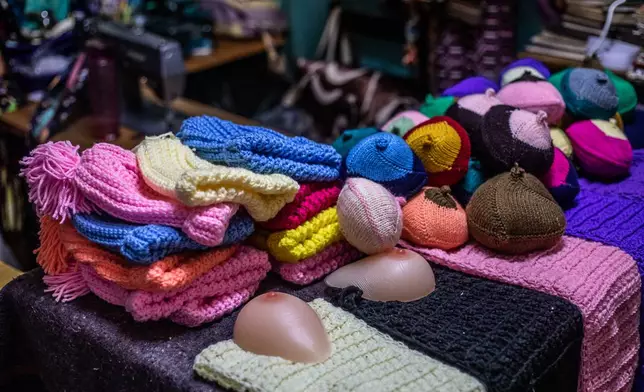 Knitted breast prosthesis are displayed on a table in Thika, Kiambu County, Kenya, Friday, Jan. 30, 2026. (AP Photo/Samson Otieno)