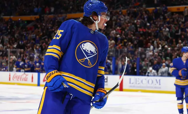 Buffalo Sabres defenseman Owen Power (25) celebrates after his goal during the first period of an NHL hockey game against the Toronto Maple Leafs, Saturday, March 14, 2026, in Buffalo, N.Y. (AP Photo/Jeffrey T. Barnes)