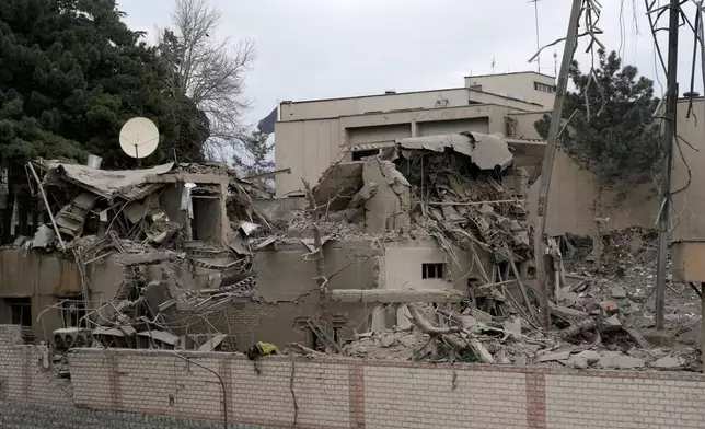 A state TV communications tower and building destroyed Sunday during a strike as part of the ongoing joint U.S.–Israeli military campaign are seen in Tehran, Iran, Tuesday, March 2, 2026. (AP Photo/Vahid Salemi)