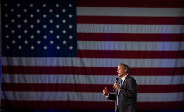 Texas Attorney General Ken Paxton speaks at the Ronald Reagan dinner during the Conservative Political Action Conference (CPAC) in Dallas, Friday, March 27, 2026. (AP Photo/Gabriela Passos)