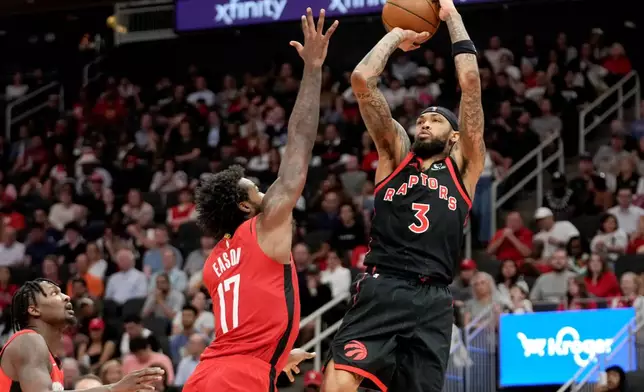 Toronto Raptors forward Brandon Ingram (3) shoots as Houston Rockets forward Tari Eason (17) defends during the second half of an NBA basketball game, Tuesday, March 10, 2026, in Houston. (AP Photo/Eric Christian Smith)