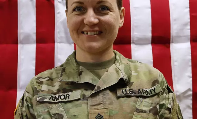 This image provided by the U.S. Army shows Sgt. 1st Class Nicole Amor, 39, of White Bear Lake, Minn., in this May 16, 2025, photo. (Sgt. Brent Newton/U.S. Amy via AP)