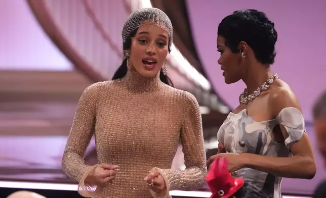 Chase Infiniti, left, and Teyana Taylor in the audience at the 32nd Annual Actor Awards on Sunday, March 1, 2026, at the Shrine Auditorium and Expo Hall in Los Angeles. (AP Photo/Chris Pizzello)