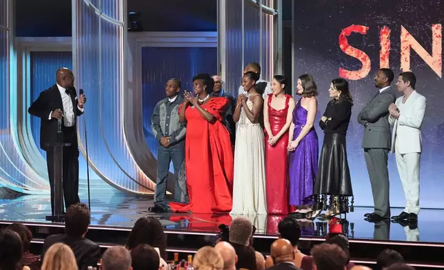 Delroy Lindo, from left, Miles Canton, Wunmi Mosaku, Omar Benson Miller, Jayme Lawson, Li Jun Li, Lola Kirke, Francine Maisler, Michael B. Jordan, and Jack O'Connell accept the award for outstanding performance by a cast in a motion picture for "Sinners" during the 32nd Annual Actor Awards on Sunday, March 1, 2026, at the Shrine Auditorium and Expo Hall in Los Angeles. (AP Photo/Chris Pizzello)
