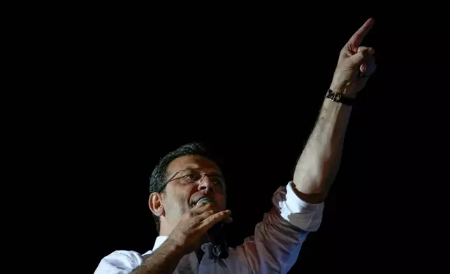 FILE - Istanbul Mayor and Republican People's Party, or CHP, candidate Ekrem Imamoglu addresses supporters outside the City Hall in Istanbul, Turkey, early Monday, April 1, 2024. (AP Photo/Khalil Hamra, File)