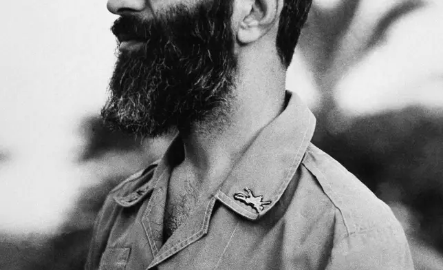 FILE - Iranian President Ayatollah Ali Khamenei stands in a military uniform in October 1981. (AP Photo, File)