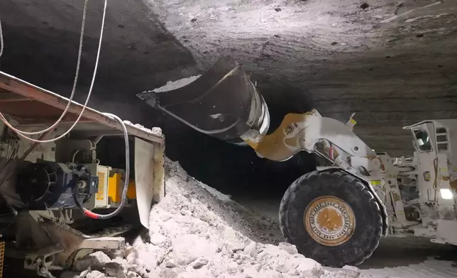 The salt, formed 440 million years ago, is mucked up and loaded onto a conveyor belt 1,800 feet below Lake Erie in Cleveland, Ohio, Thursday, March 19, 2026. (AP Photo/Sue Ogrocki)