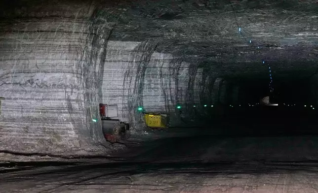 Salt pillars, left behind for support during mining, line the tunnels in the Cargill salt mine in, 1,800 feet below the surface of Lake Erie on Whiskey Island in Cleveland, Ohio, Thursday, March 19, 2026. (AP Photo/Sue Ogrocki)