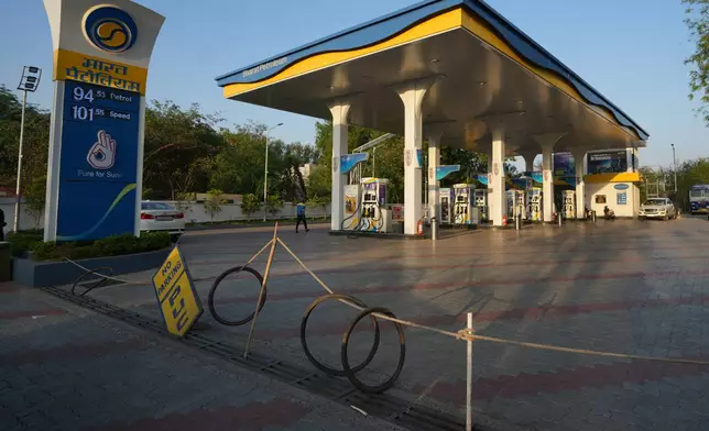 A gas station is empty due to a fuel shortage in Ahmedabad, India, Monday, March 23, 2026. (AP Photo/Ajit Solanki)