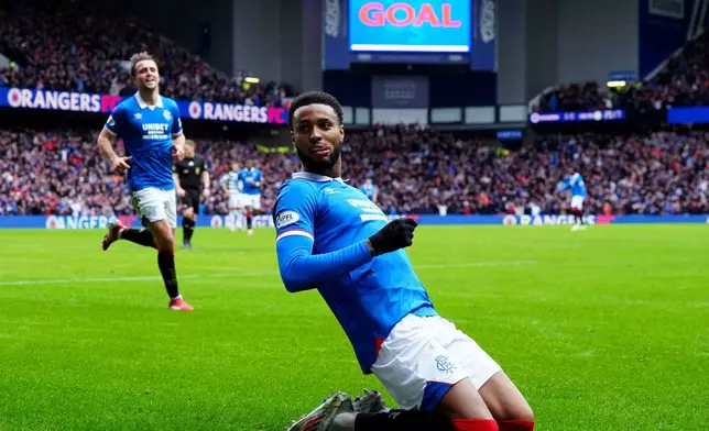 Ranger's Youssef Chermiti celebrates after scoring his side's second goal during the Scottish Premiership match between Glasgow Rangers and Celtic Glasgow in Glasgow, Scotland, Sunday, March 1, 2026. ( Jane Barlow/PA via AP)