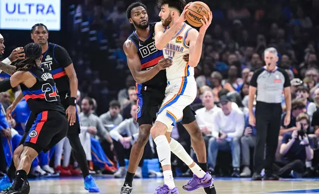 Oklahoma City Thunder center/forward Chet Holmgren (7) pressures during the first half of an NBA basketball game against the Detroit Pistons Monday, March. 30, 2026, in Oklahoma City. (AP Photo/Gerald Leong)