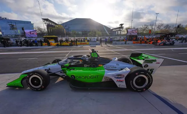 Driver Louis Foster (45) drives during practice for the IndyCar Grand Prix of Arlington auto race, Saturday, March 14, 2026, in Arlington, Texas. (AP Photo/LM Otero)
