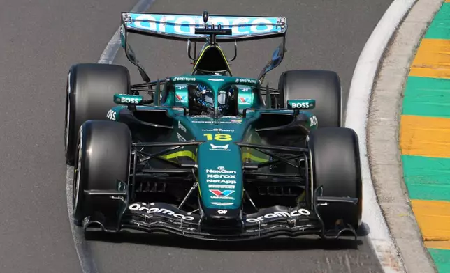 Aston Martin driver Lance Stroll of Canada steers his car during the first practice session for the Australian Formula One Grand Prix at Albert Park, in Melbourne, Australia, Friday, March 6, 2026. (AP Photo/Scott Barbour)