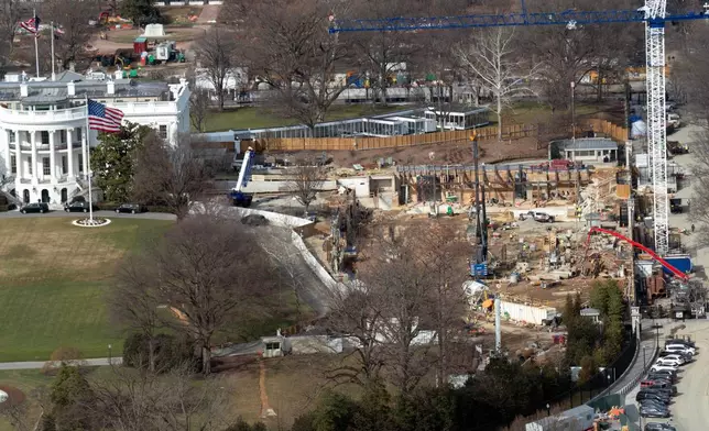 Work continues on the construction of the ballroom at the White House, Tuesday, Feb. 24, 2026, in Washington, where the East Wing once stood. (AP Photo/Jose Luis Magana)