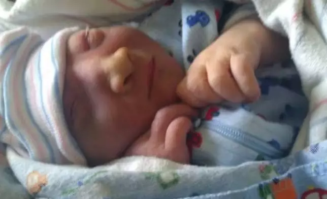 This photo provided by Andrea Lopez shows her son, Gabriel Crude, at a hospital Bakersfield, Calif., in 2011, where he was born with anencephaly, a rare and severe birth defect tied to a lack of folic acid, a key vitamin. (Courtesy Andrea Lopez via AP)