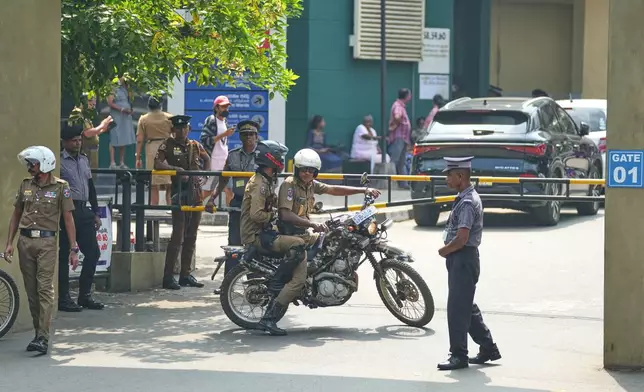 Motorcycle mounted policemen patrol at the National Hospital where rescued Iranian sailors from the IRIS Dena warship by the Sri Lankan Navy are receiving treatment, in Galle, Sri Lanka, Thursday, March 5, 2026. (AP Photo/Eranga Jayawardena)