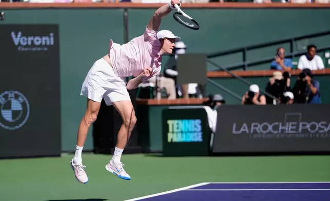 Jannik Sinner, of Italy, serves against Alexander Zverev, of Germany, during a semifinal match at the BNP Paribas Open tennis tournament, Saturday, March 14, 2026, in Indian Wells, Calif. (AP Photo/Mark J. Terrill)
