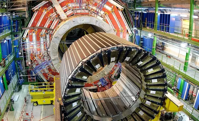 FILE - The magnet core of the world's largest superconducting solenoid magnet (CMS, Compact Muon Solenoid) at the European Organization for Nuclear Research (CERN)'s Large Hadron Collider (LHC) particle accelerator, in Geneva, Switzerland, March 22, 2007. (AP Photo/Keystone, Martial Trezzini, File)