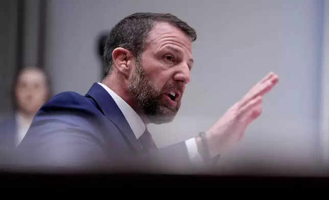 Sen. Markwayne Mullin, R-Okla., President Donald Trump's pick for Homeland Security secretary, testifies during Senate Committee on Homeland Security and Governmental Affairs hearing, Wednesday, March 18, 2026 on Capitol Hill in Washington. (AP Photo/Manuel Balce Ceneta)