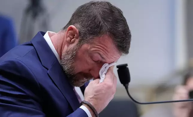 Sen. Markwayne Mullin, R-Okla., President Donald Trump's pick for Homeland Security secretary, testifies during Senate Committee on Homeland Security and Governmental Affairs hearing, Wednesday, March 18, 2026 on Capitol Hill in Washington. (AP Photo/Manuel Balce Ceneta)