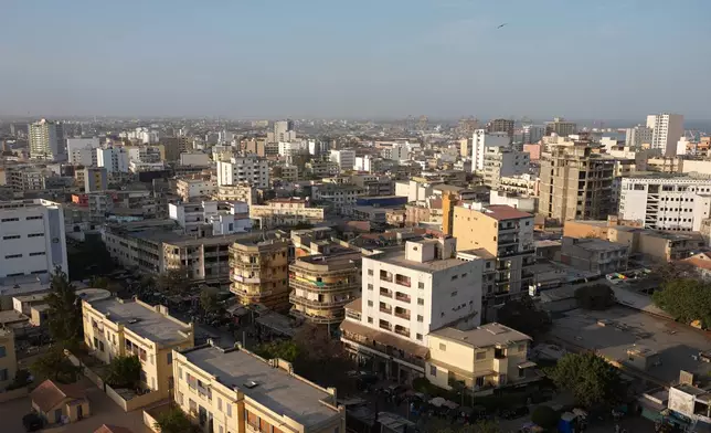 A general view of downtown in Dakar, Senegal, Wednesday, March 18, 2026. (AP Photo/Misper Apawu)
