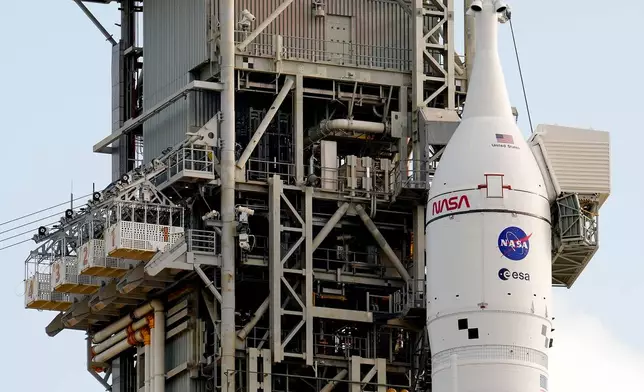 NASA's Artermis II moon rocket sits on Launch Pad 39-B at the Kennedy Space Center Sunday, March 29, 2026, in Cape Canaveral, Fla. (AP Photo/Chris O'Meara)