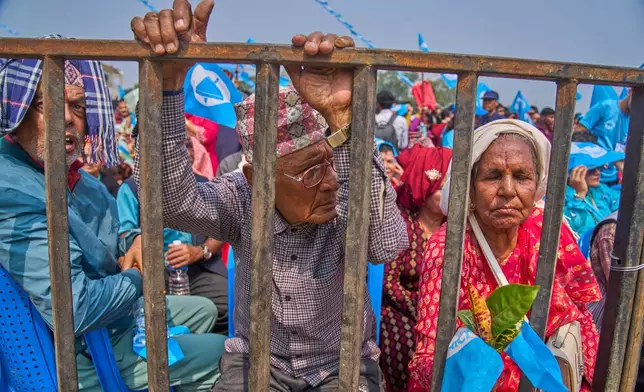 Supporters of the Rastriya Swatantra Party wait for the arrival of rapper-turned-politician Balendra Shah during an election campaign rally in Chitwan, approximately 180 kilometers (112 miles) west of Kathmandu, Nepal, Friday, Feb. 27, 2026. (AP Photo/Niranjan Shrestha)