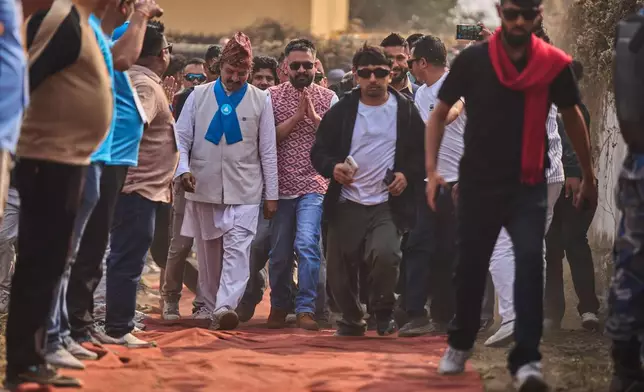 Rapper-turned-politician Balendra Shah, Prime ministerial candidate of the Rastriya Swatantra Party arrives at an election campaign rally in Chitwan, about 112 miles (180 kilometers) west of Kathmandu, Nepal, Friday, Feb. 27, 2026. (AP Photo/Niranjan Shrestha)