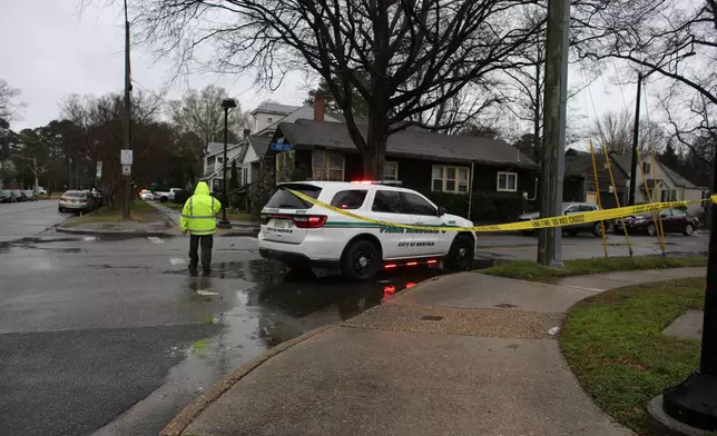 Police arrive outside Old Dominion University's campus after reports of an active shooter on Thursday, March 12, 2026, in Norfolk, Va. (AP Photo/John Clark)