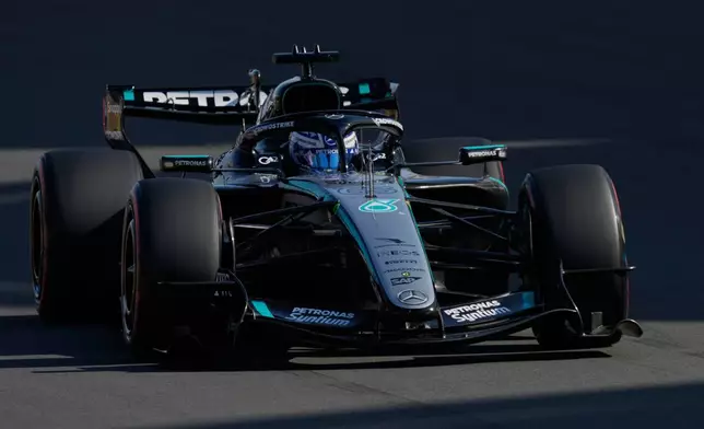 Mercedes driver George Russell of Britain steers his car during the qualifying session of the Chinese Formula One Grand Prix at the Shanghai International Circuit, in Shanghai, China, Saturday, March 14, 2026. (AP Photo/Vincent Thian)