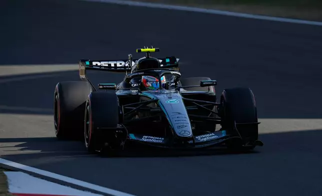 Mercedes driver Andrea Kimi Antonelli of Italy steers his car during the qualifying session of the Chinese Formula One Grand Prix at the Shanghai International Circuit, in Shanghai, China, Saturday, March 14, 2026. (AP Photo/Vincent Thian)