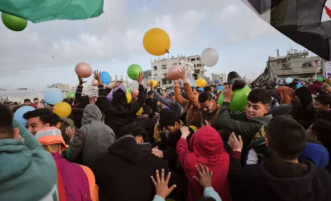 Palestinians celebrate Eid al-Fitr in Jabaliya, Gaza Strip, Friday, March 20, 2026. (AP Photo/Jehad Alshrafi)