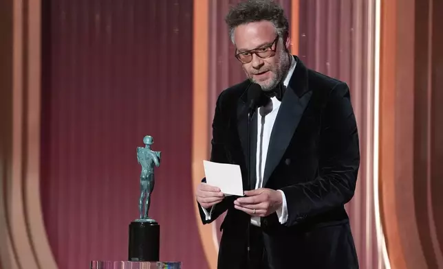 Seth Rogen accepts the award for outstanding performance by a female actor in a comedy series for "The Studio" on behalf of Catherine O'Hara during the 32nd Annual Actor Awards on Sunday, March 1, 2026, at the Shrine Auditorium and Expo Hall in Los Angeles. (AP Photo/Chris Pizzello)