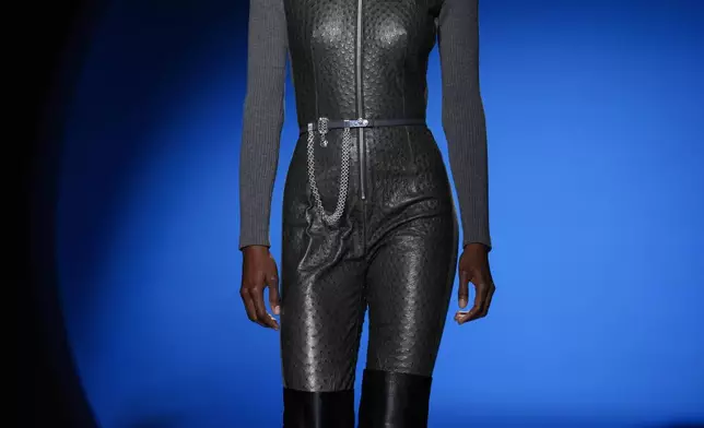 A model wears a creation as part of the Hermes Fall/Winter 2026-2027 Women's collection presented in Paris, Saturday, March 7, 2026. (AP Photo/Aurelien Morissard)