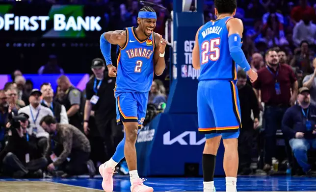 Oklahoma City Thunder guard Shai Gilgeous-Alexander (2) celebrates during the first half of an NBA basketball game against the Denver Nuggets Monday, Mar. 9, 2026, in Oklahoma City. (AP Photo/Gerald Leong)