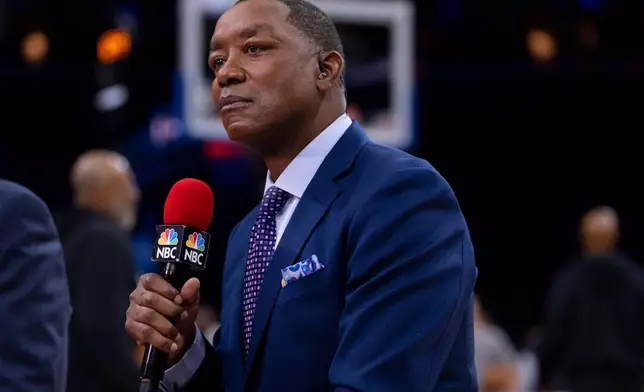 Former NBA player and NBC analyst Isiah Thomas looks on prior to an NBA basketball game between the San Antonio Spurs and the Philadelphia; 76ers, Tuesday, March 3, 2026, in Philadelphia. (AP Photo/Chris Szagola)