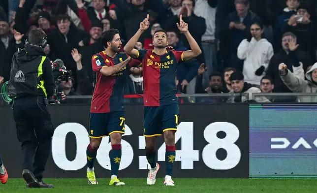 Genoa's Junior Messias celebrates after scoring during the Italian Serie A soccer match between Genoa and Roma in Genoa, Italy, Sunday, March 8, 2026. (Tano Pecoraro/LaPresse via AP)
