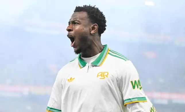 Roma's Evan Ndicka celebrates after scoring during the Italian Serie A soccer match between Genoa and Roma in Genoa, Italy, Sunday, March 8, 2026. (Tano Pecoraro/LaPresse via AP)