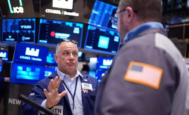 Joel Lucchese works on the floor at the New York Stock Exchange in New York, Thursday, March 5, 2026. (AP Photo/Seth Wenig)