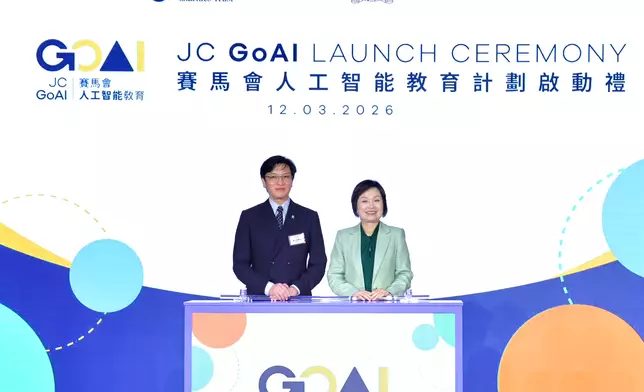 HKSAR Government Secretary for Education Dr Christine Choi (right) and Club Steward Dr Henry Chan (left) officiate at the JC GoAI project launch ceremony.