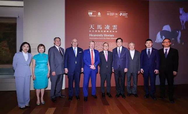 Guests tour the “Heavenly Horses: Masterpieces from the Palace Museum” exhibition.