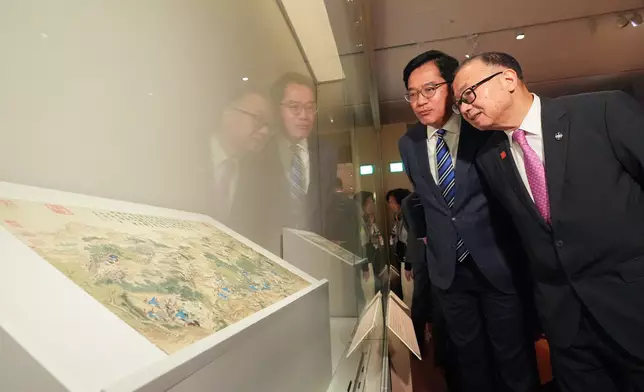 Guests tour the “Heavenly Horses: Masterpieces from the Palace Museum” exhibition.