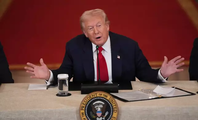 President Donald Trump speaks during a roundtable discussion on college sports in the East Room of the White House, Friday, March 6, 2026, in Washington. (AP Photo/Julia Demaree Nikhinson)
