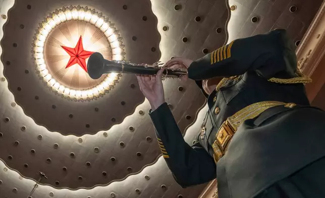 FILE - Military band members rehearse before the closing session of the National People's Congress (NPC) at the Great Hall of the People in Beijing, March 12, 2026. (AP Photo/Ng Han Guan, File)