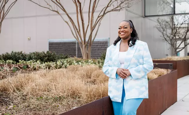 Michele Jawando, the next CEO of the Omidyar Network, poses for a photo at the company's office in Washington, Wednesday, March 11, 2026. (AP Photo/Moriah Ratner)
