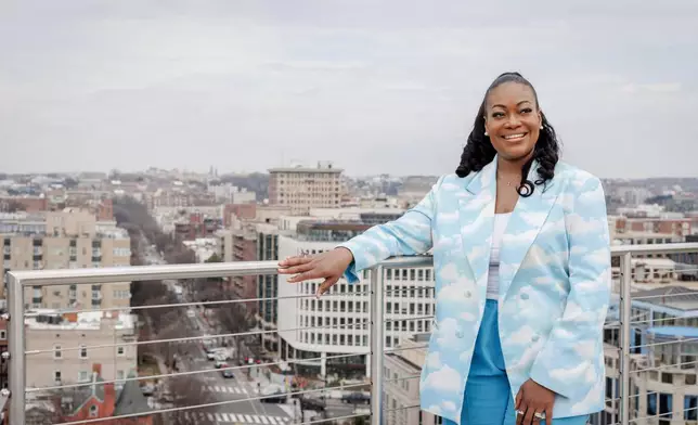 Michele Jawando, the next CEO of the Omidyar Network, poses for a photo at the company's office in Washington, Wednesday, March 11, 2026. (AP Photo/Moriah Ratner)