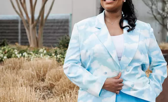 Michele Jawando, the next CEO of the Omidyar Network, poses for a photo at the company's office in Washington, Wednesday, March 11, 2026. (AP Photo/Moriah Ratner)