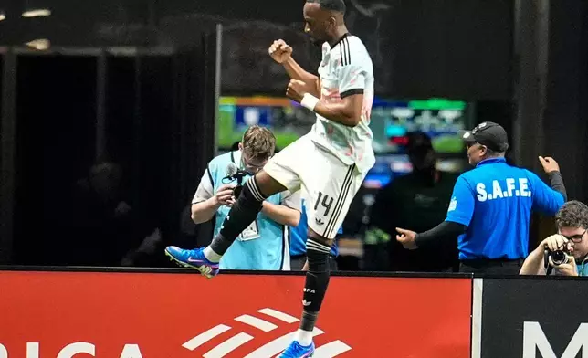Belgium's Dodi Lukebakio celebrates his goal against the United States during the second half of an international friendly soccer match, Saturday, March 28, 2026, in Atlanta. (AP Photo/Mike Stewart)