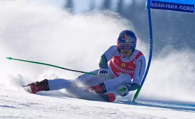 Brazil's Lucas Pinheiro Braathen competes during an alpine ski, men's World Cup giant slalom, in Kranjska Gora, Slovenia, Saturday, March 7, 2026. (AP Photo/Giovanni Auletta)